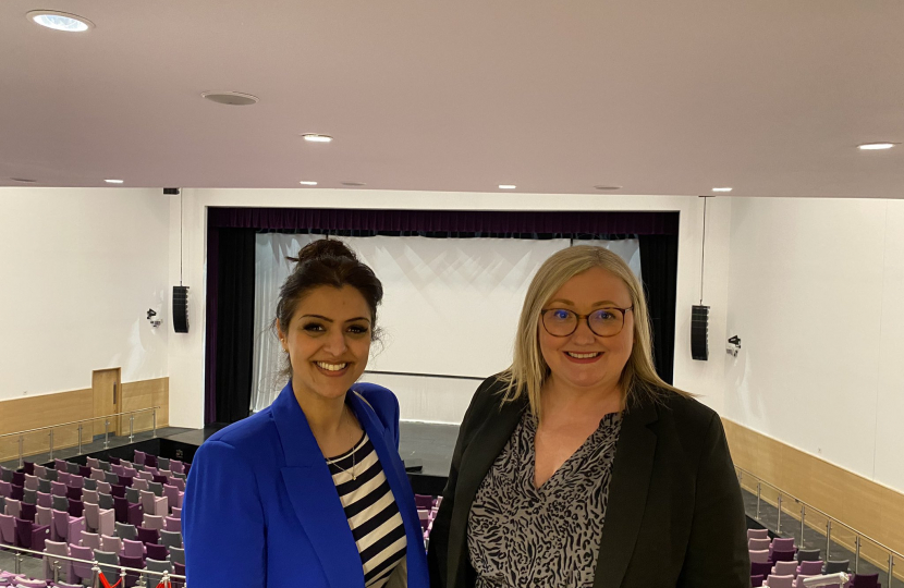 Natasha Asghar MS with Danielle Bounds inside the ICC's auditorium.