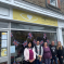 Natasha Asghar MS outside Sight Cymru's first charity shop.